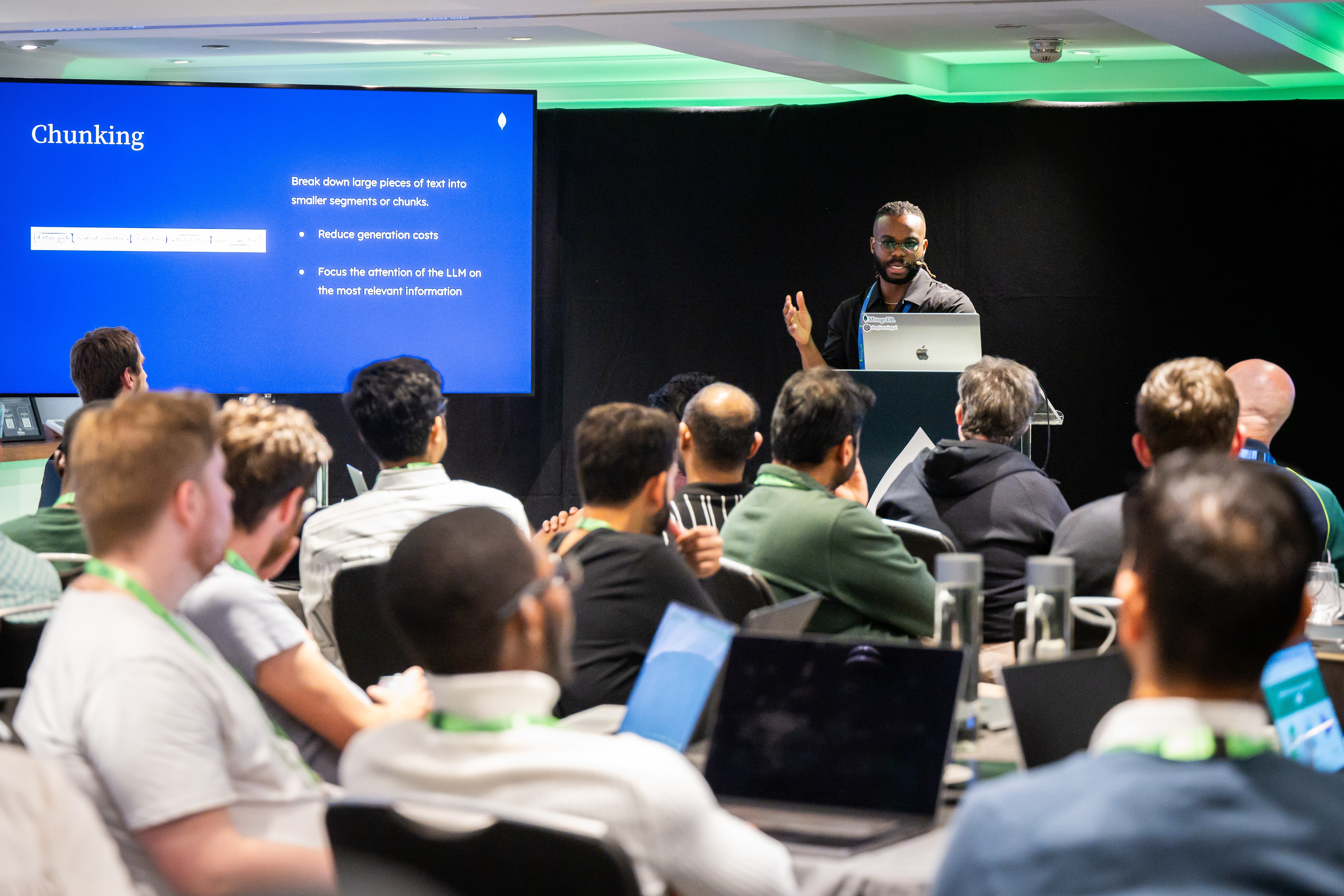 Photo of MongoDB Sttaff Developer Advocate for AI, Richmond Alake, running a session at .local London 2024.