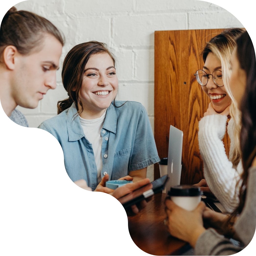 MongoDB employees talking around a shared desk